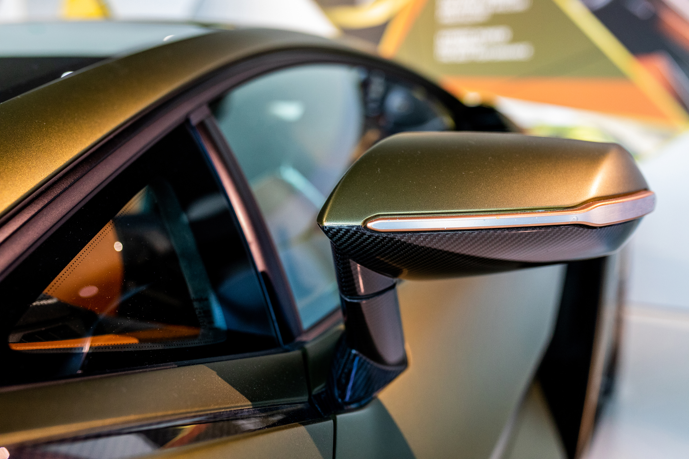 Autohaus Website sleek bronze car detail and carbon fiber 2026 03 18 04 33 30 utc